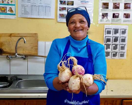 a person holding produce