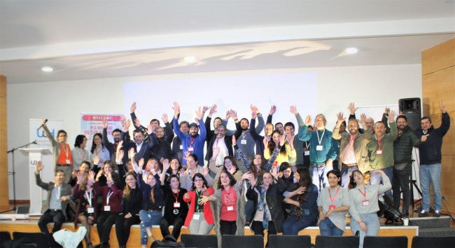 Participants in a meeting about pig welfare