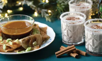 A beautiful holiday spread of mushroom potsticker dumplings and coconut nog.