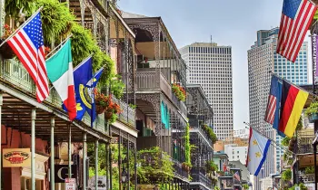 Balconies on buildings and houses with wrought iron in the French Quarter, New Orleans