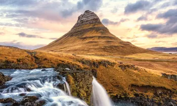 Photo of the famous waterfall Kirkjufellsfoss in autumn.