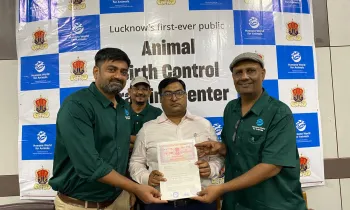 a group of men holding a certificate