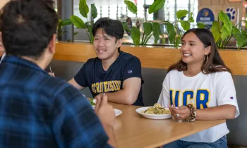 Group of students eating in dining hall