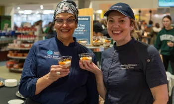 Chef Jen and Chef Tracy serving Thai Tea Tiramisu