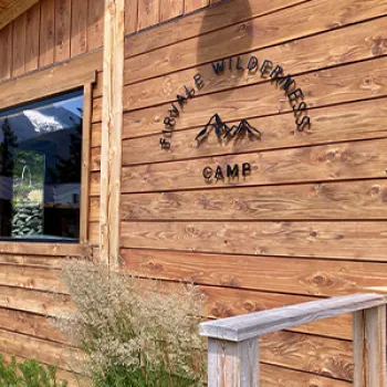 The exterior wall of a wooden cabin