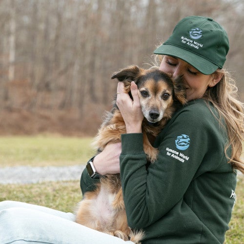 Humane World for Animals employee with their dog, Flea