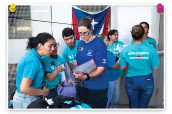 Hilary Hager instructs volunteers during Spayathon™ for Puerto Rico.