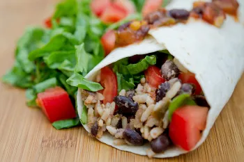vegan burrito with black beans, rice and veggies