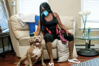 Portrait of Denise Young with her dog Drama.
