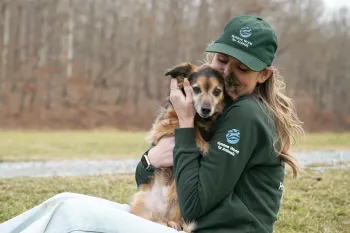 Humane World for Animals employee with their dog, Flea