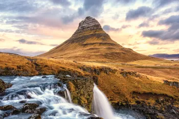 Photo of the famous waterfall Kirkjufellsfoss in autumn.