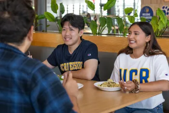 Group of students eating in dining hall