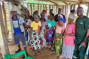 Jallah Fahnbulleh from Second Chance Chimpanzee Refuge Liberia with local community at Bassa Point