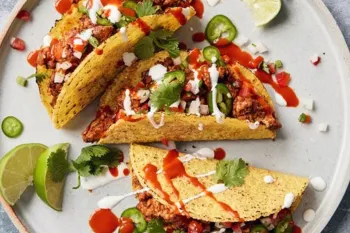 Three tacos on a plate