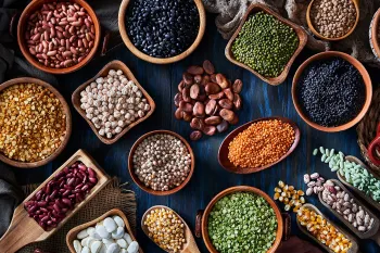 Legumes and beans on a rustic wooden table
