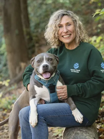 Kitty Block, President and CEO of the Humane World for Animals, poses with Mini