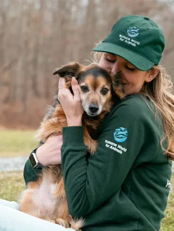 Humane World for Animals employee with their dog, Flea