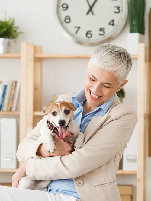 Woman and her dog in the workplace