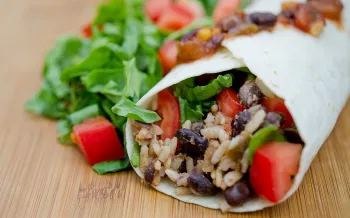 vegan burrito with black beans, rice and veggies