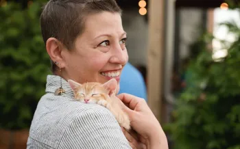 woman holding kitten at KC Pet Project event