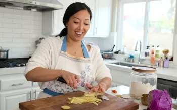 Joanne Molinaro, the Korean Vegan, chops ingredients for a recipe