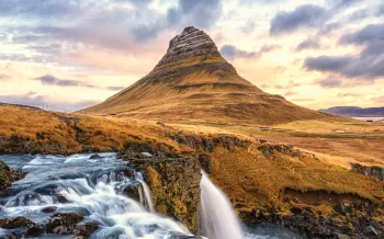 Photo of the famous waterfall Kirkjufellsfoss in autumn.