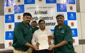 a group of men holding a certificate