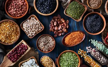 Legumes and beans on a rustic wooden table