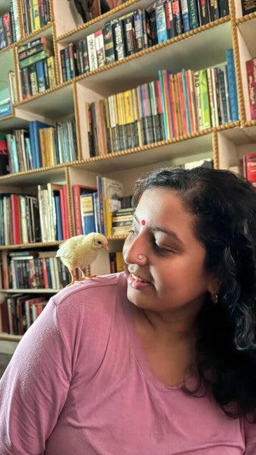 Humane World for Animals India's Sally Varma rescued Tweety the chick from a trash pile at an egg farm in India.